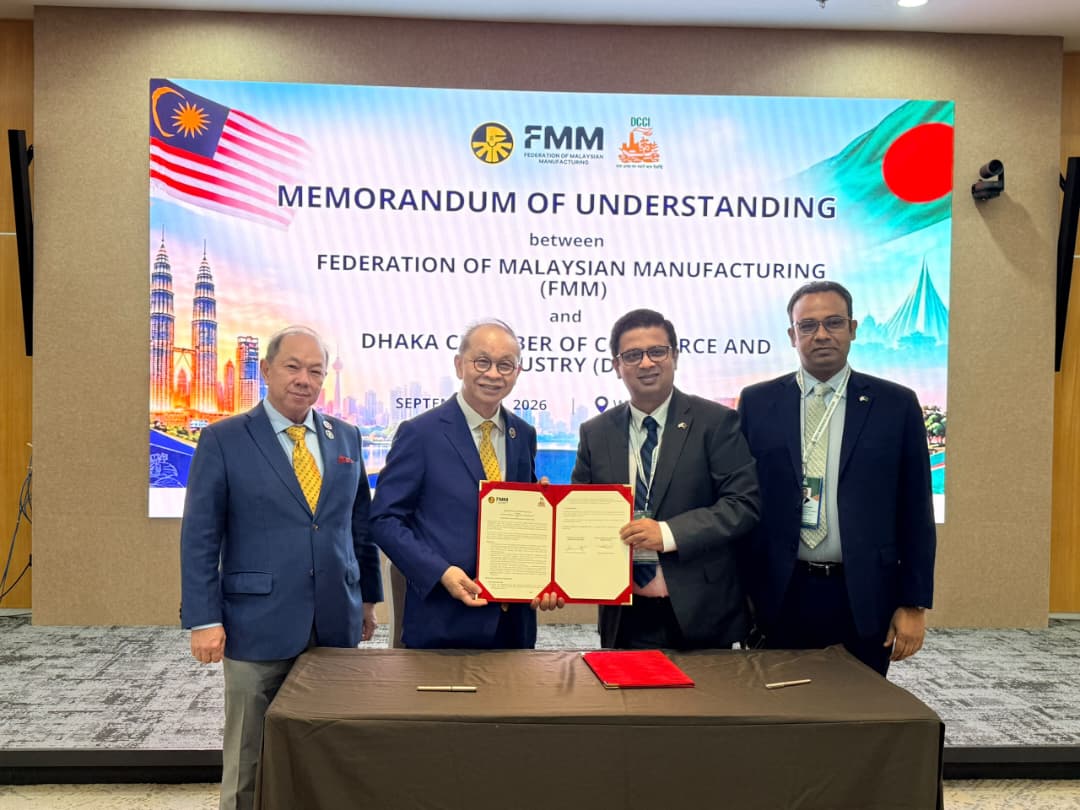 Photo 2 FMM - DCCI Forum MOU Signing.jpeg